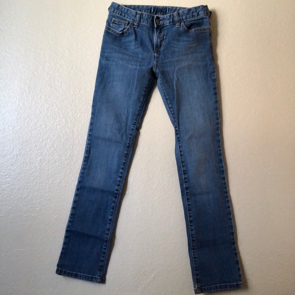 Dark wash jeans.